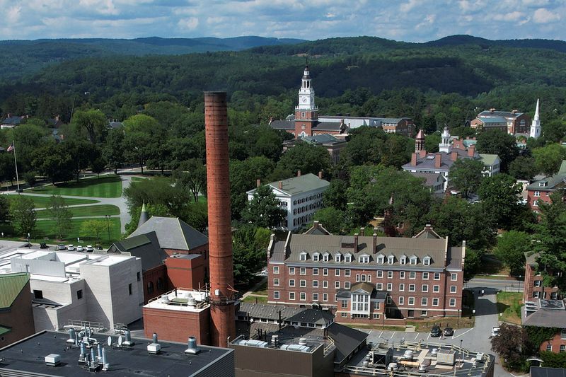 &copy; Reuters. FILE PHOTO: A chimney stack rises out of Dartmouth College's Heating Plant in Hanover, New Hampshire, U.S., August 25, 2022.     REUTERS/Brian Snyder/File Photo