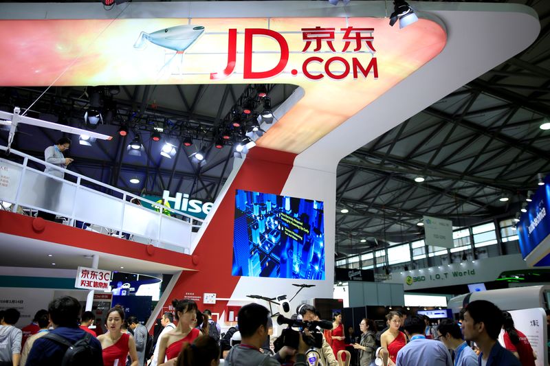 &copy; Reuters. A sign of China's e-commerce company JD.com is seen at CES (Consumer Electronics Show) Asia 2016 in Shanghai, China, May 12, 2016. REUTERS/Aly Song/File Photo