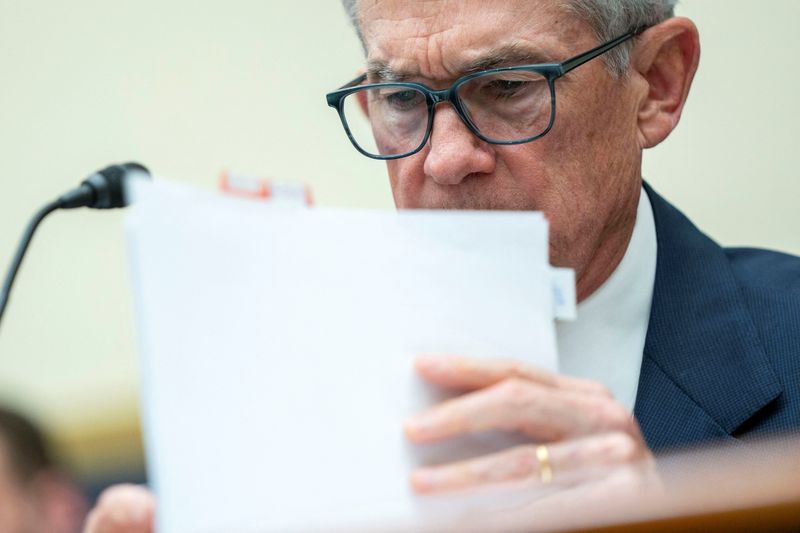 &copy; Reuters. Federal Reserve Chair Jerome Powell reads notes during a House Financial Services Committee hearing on the "Federal Reserve's Semi-Annual Monetary Policy Report" on Capitol Hill in Washington, U.S., March 6, 2024. REUTERS/Bonnie Cash
