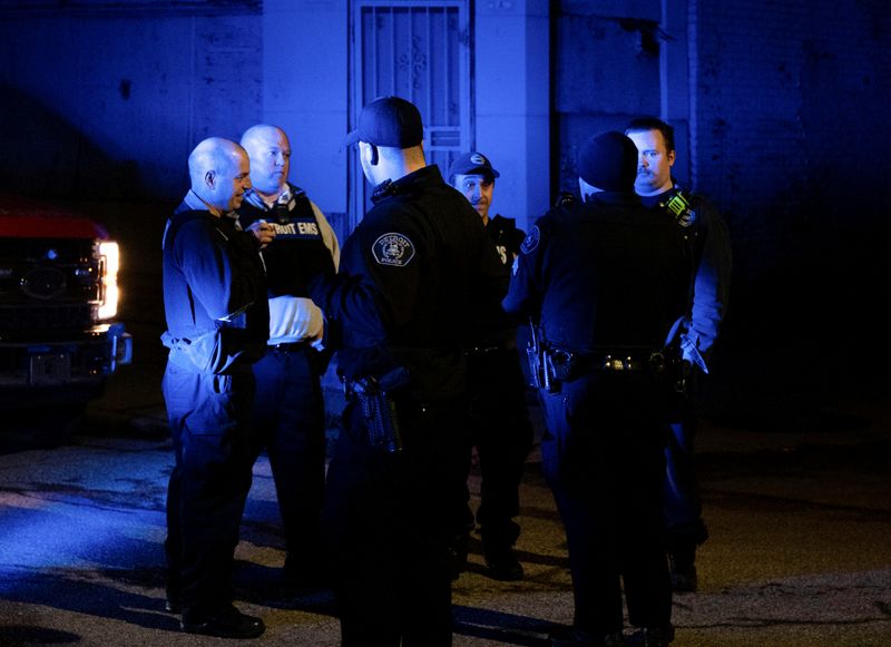 &copy; Reuters. Detroit Police Department along with other area police units setup a perimeter near the Detroit Impression Company where the parents of school shooter Ethan Crumbley were found hiding and taken into police custody early Saturday morning in Detroit, U.S., 