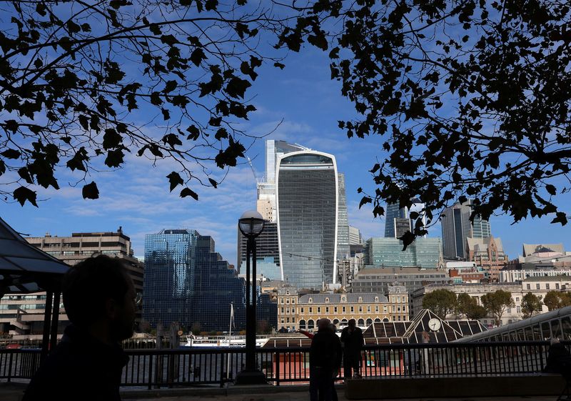 &copy; Reuters. People walk alongside the City of London financial district in London, Britain, October 25, 2023.  REUTERS/ Susannah Ireland