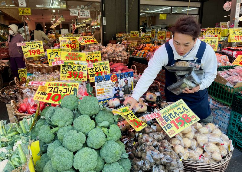 &copy; Reuters. Store owner Hiromichi Akiba works at his supermarket 'Akidai' in Tokyo, Japan, February 16, 2024.  REUTERS/Tim Kelly