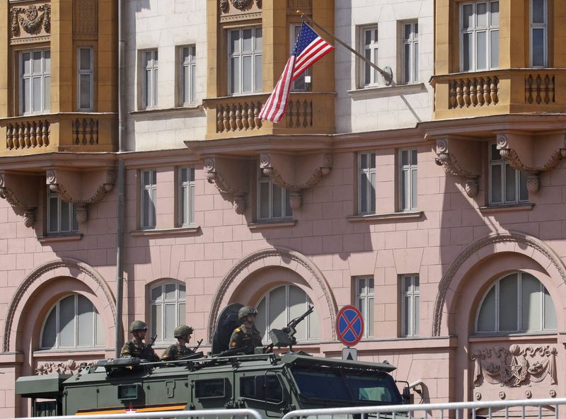 &copy; Reuters. FILE PHOTO: Russian service members drive an all-terrain armoured vehicle past the U.S. embassy after a military parade on Victory Day, which marks the 78th anniversary of the victory over Nazi Germany in World War Two, in Moscow, Russia May 9, 2023. REUT