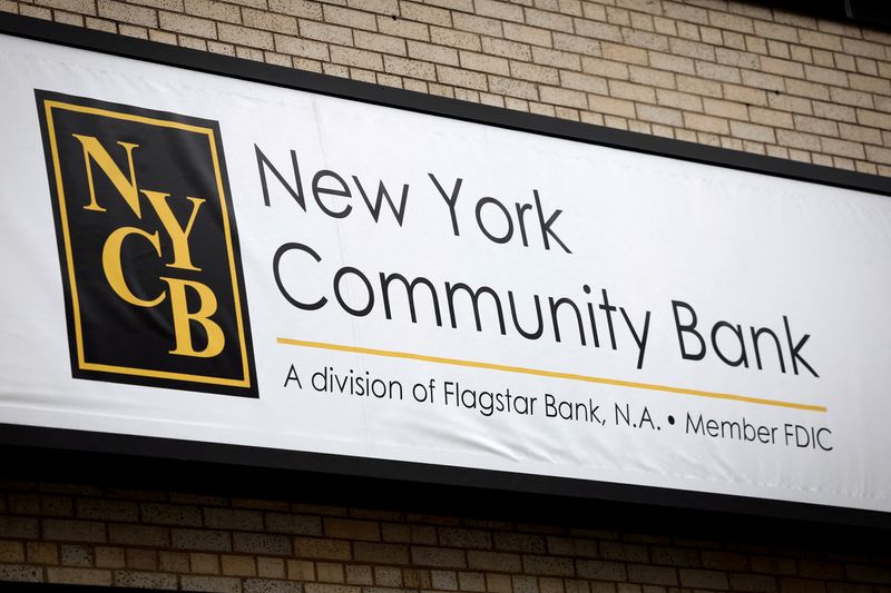 &copy; Reuters. FILE PHOTO: A sign is pictured above a branch of the New York Community Bank in Yonkers, New York, U.S., January 31, 2024. REUTERS/Mike Segar/File Photo