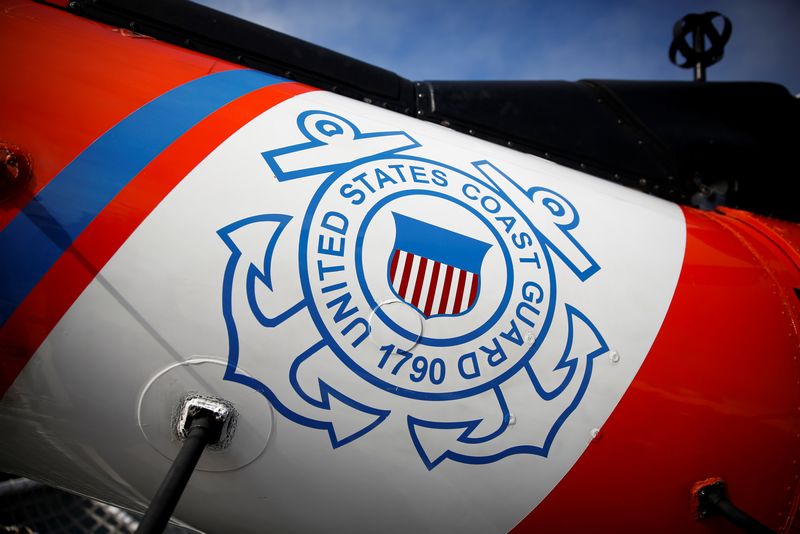 © Reuters. The U.S. Coast Guard's logo is seen on an helicopter on the deck of the Coast Guard Cutter Hamilton at Port Everglades, in Fort Lauderdale, Florida, U.S. November 22, 2021. REUTERS/Marco Bello/File Photo