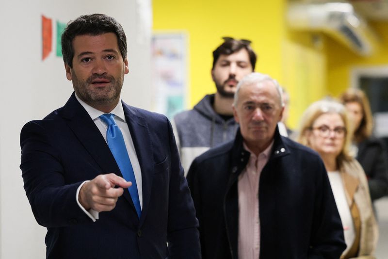 &copy; Reuters. Far right political party Chega leader Andre Ventura gestures as he queues at a polling station during the general election in Lisbon, Portugal, March 10, 2024. REUTERS/Violeta Santos Moura