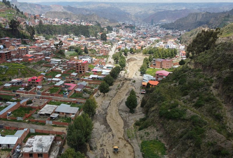 &copy; Reuters. A drone view shows the Kellumani river overflowing due to heavy rains in the Chijipata area, in La Paz, Bolivia March 9, 2024. REUTERS/Claudia Morales   