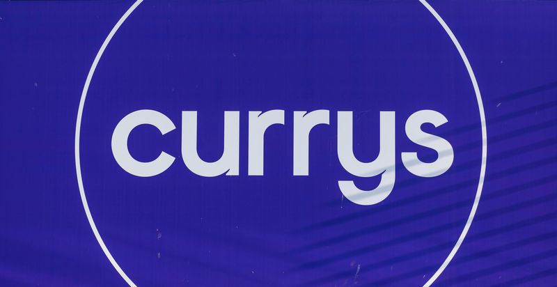 &copy; Reuters. The company logo is pictured on a Currys store in London, Britain, December 2, 2021. Picture taken December 2, 2021. REUTERS/May James/file photo