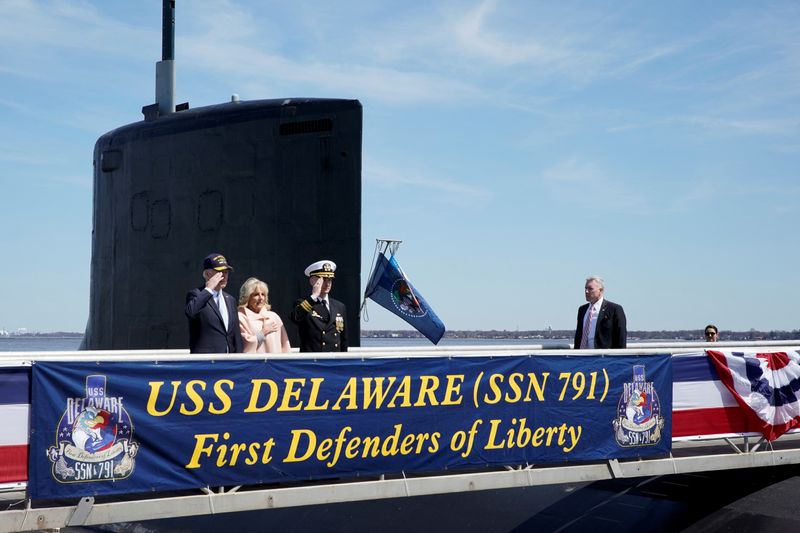 &copy; Reuters. U.S. President Joe Biden and first lady Jill Biden board the USS Delaware nuclear submarine for a tour during a commemorative commissioning ceremony at the Port of Wilmington, Delaware, U.S., April 2, 2022. REUTERS/Elizabeth Frantz/ File Photo