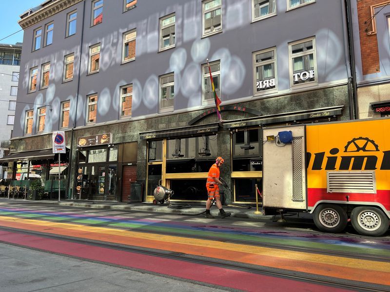 &copy; Reuters. FILE PHOTO: A worker walks in front of the London Pub, a gay bar that was the site of a mass shooting in 2022, in Oslo, Norway, June 8, 2023. REUTERS/Gwladys Fouche/ File photo