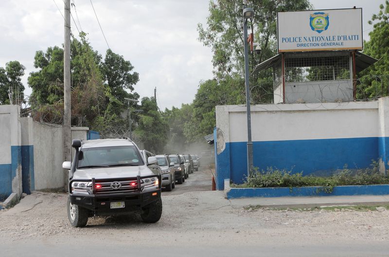 &copy; Reuters. FILE PHOTO: A convoy of cars carrying members of a Kenyan delegation leave the premises of Haitian National Police (PNH) after meeting with the Chief of the Haitian National Police Frantz Elbe, in Port-au-Prince, Haiti, August 21, 2023. REUTERS/Ralph Tedy