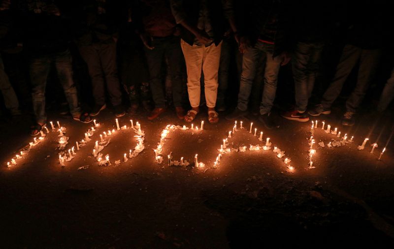 &copy; Reuters. FILE PHOTO: Candles spell out "No CAA" during a protest against the Citizenship Amendment Act, a new citizenship law, in New Delhi, India, December 29, 2019. REUTERS/Anushree Fadnavis/File Photo