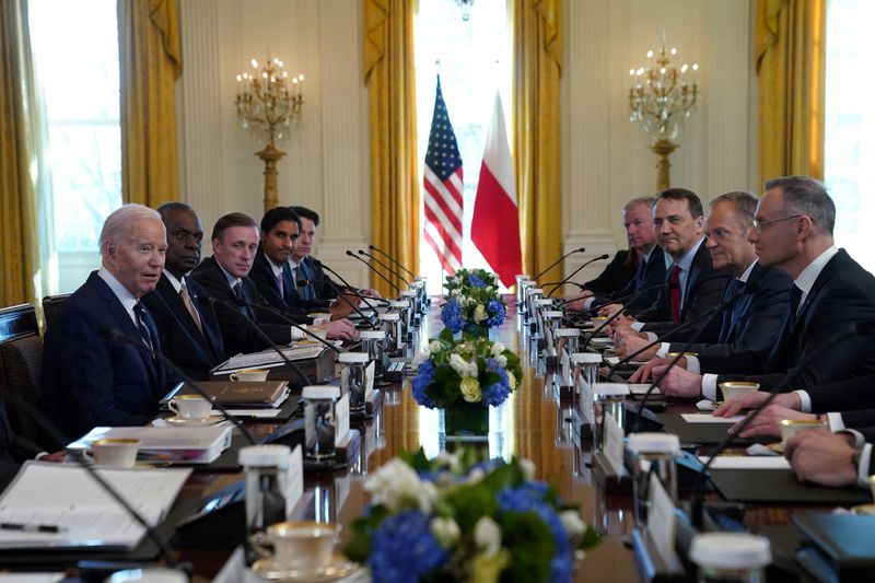 &copy; Reuters. 　３月１２日、ポーランドのドゥダ大統領は、バイデン米大統領と会談し、原子力分野での協力拡大について協議した。写真は米ワシントンにあるホワイトハウスで撮影（２０２４　ロイタ