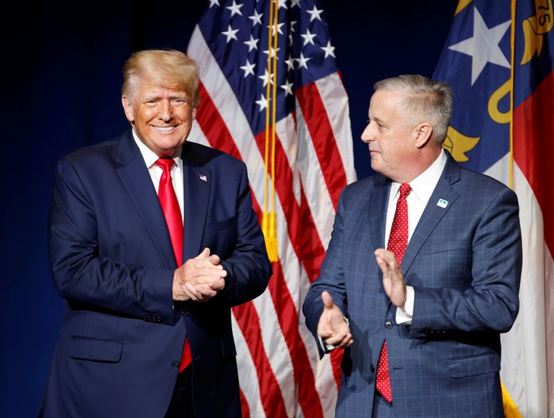 &copy; Reuters. FILE PHOTO: Former U.S. President Donald Trump is introduced by North Carolina Republican Party chairman Michael Whatley before speaking at the North Carolina GOP convention dinner in Greenville, North Carolina, U.S. June 5, 2021.  REUTERS/Jonathan Drake/
