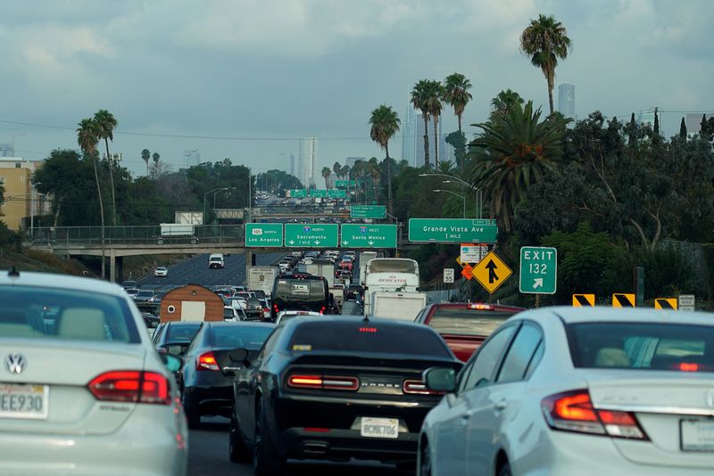 &copy; Reuters. FILE PHOTO: Morning traffic makes its way along a Los Angeles freeway in Los Angeles, California, U.S., September 19, 2019.  REUTERS/Mike Blake/File Photo