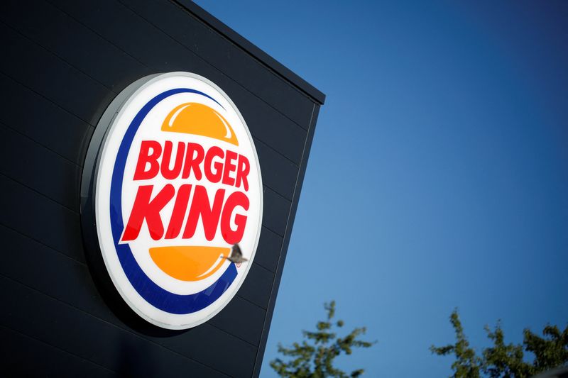 &copy; Reuters. FILE PHOTO: The Burger King company logo stands on a sign outside a restaurant in Bretigny-sur-Orge, near Paris, France, July 30, 2020. REUTERS/Benoit Tessier/File Photo