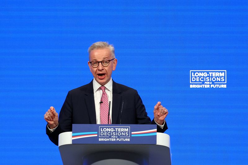 &copy; Reuters. FILE PHOTO: British Secretary of State for Levelling Up, Housing and Communities Michael Gove speaks on stage at Britain's Conservative Party's annual conference in Manchester, Britain, October 3, 2023. REUTERS/Hannah McKay/File Photo