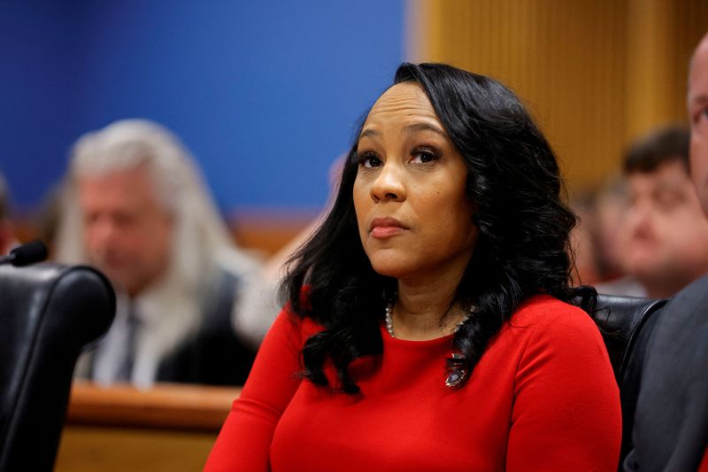 © Reuters. FILE PHOTO: Fulton County District Attorney Fani Willis attends a hearing on the Georgia election interference case, March 1, 2024, in Atlanta, Georgia, U.S. Alex Slitz/Pool via REUTERS/File Photo