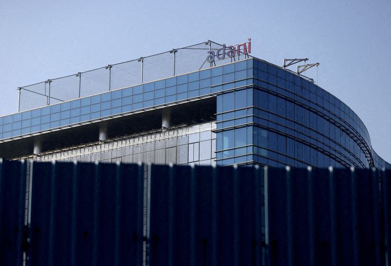 &copy; Reuters. FILE PHOTO: A logo of the Adani Group is seen on a commercial complex in Mumbai, India, February 7, 2023. REUTERS/Francis Mascarenhas/File Photo