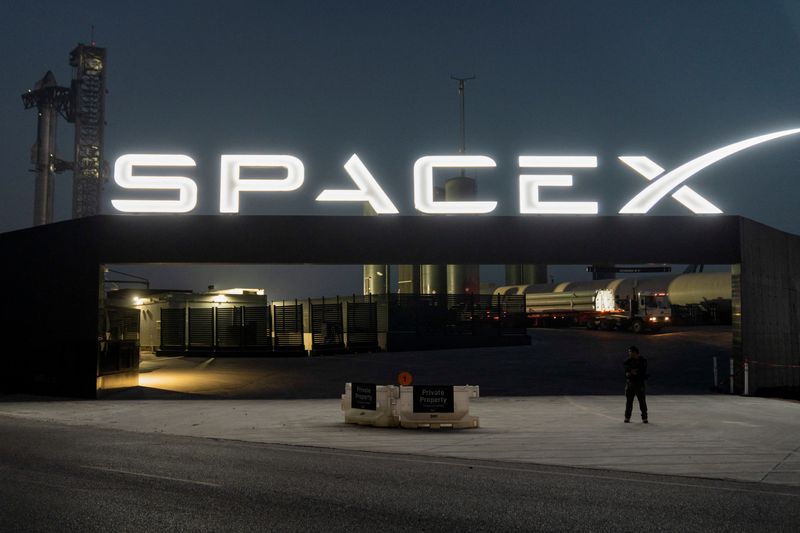 &copy; Reuters. FILE PHOTO: A security guard monitors the entrance as SpaceX's next-generation Starship spacecraft atop its powerful Super Heavy rocket is prepared for a third launch from the company's Boca Chica launchpad on an uncrewed test flight, near Brownsville, Te
