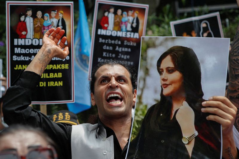 &copy; Reuters. A demonstrator shouts slogans during a protest against the Iranian regime, following the death of Mahsa Amini, outside Embassy of Iran in Jakarta , Indonesia, October 18, 2022. REUTERS/Ajeng Dinar Ulfiana/File Photo