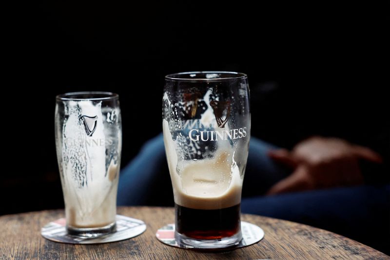 &copy; Reuters. Guinness glasses are seen in a pub, in Dublin, Ireland March 20, 2023. REUTERS/Clodagh Kilcoyne/file photo
