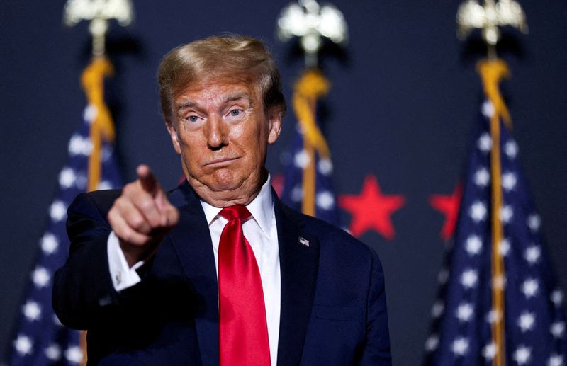 &copy; Reuters. FILE PHOTO: Republican presidential candidate and former U.S. President Donald Trump gestures at a campaign event ahead of the Republican presidential primary election in North Charleston, South Carolina, U.S. February 14, 2024. REUTERS/Sam Wolfe/File Pho