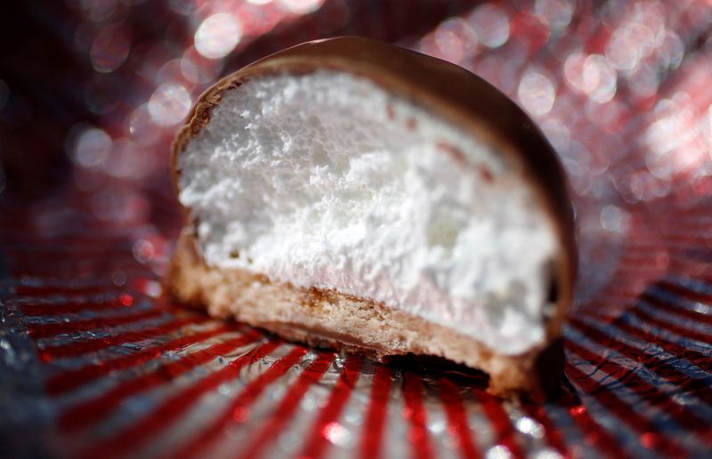 © Reuters. FILE PHOTO: A Tunnock's Tea Cake is seen in Edinburgh, Scotland May 2, 2014. Started in 1890,  REUTERS/Suzanne Plunkett/File Photo