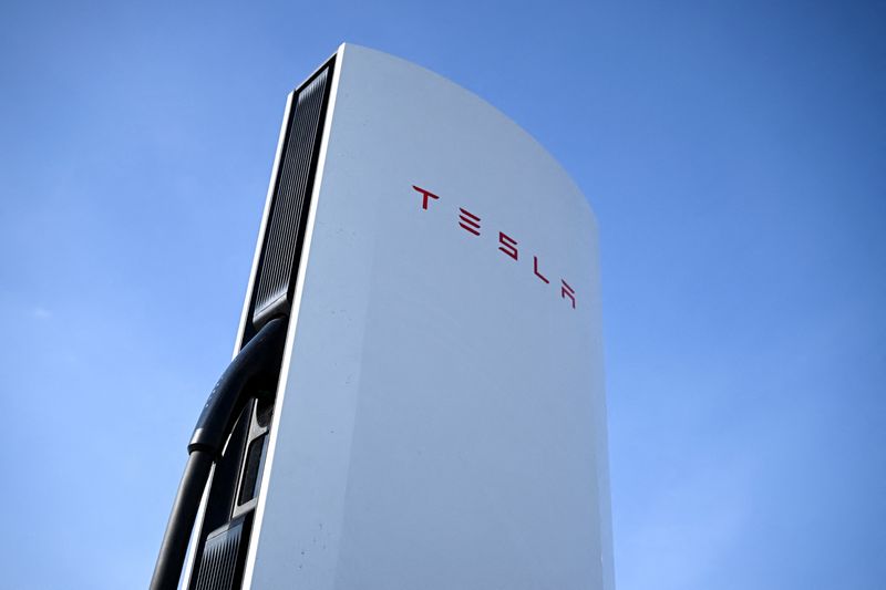 &copy; Reuters. FILE PHOTO: A detail of a Tesla electric vehicle charging station is pictured on a car park of the A10 shopping center in Wildau near Berlin, Germany, March 20, 2024. REUTERS/Annegret Hilse/File Photo
