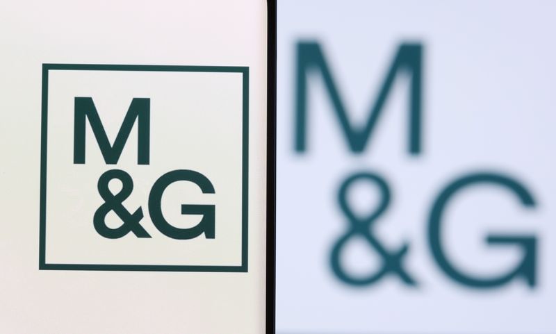 &copy; Reuters. M&G plc logo is seen on a smartphone in front of displayed same logo in this illustration taken, December 1, 2021. REUTERS/Dado Ruvic/Illustration/file photo