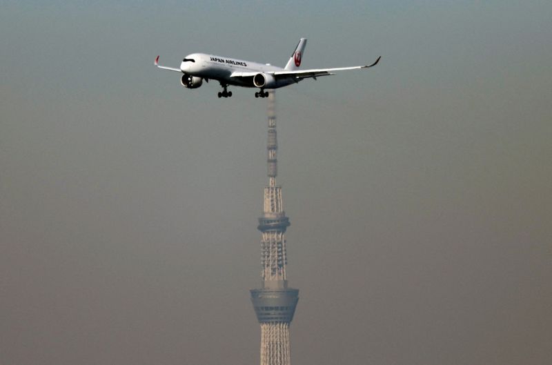 &copy; Reuters. An airplane of Japan Airlines (JAL) approaches to land as Tokyo Skytree, the world's tallest broadcasting tower, is seen in the background, at Haneda International Airport in Tokyo, Japan January 5, 2024. REUTERS/Issei Kato/file photo