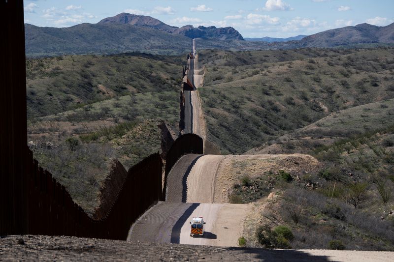 © Reuters. FILE PHOTO: An Arivaca Fire District ambulance drives over steep grades at a remote section of the U.S.-Mexico border, a site of frequent medical emergencies where migrants are sometimes stuck for days at a time, in the east of Sasabe, Arizona, U.S. March 9, 2024. REUTERS/Rebecca Noble
