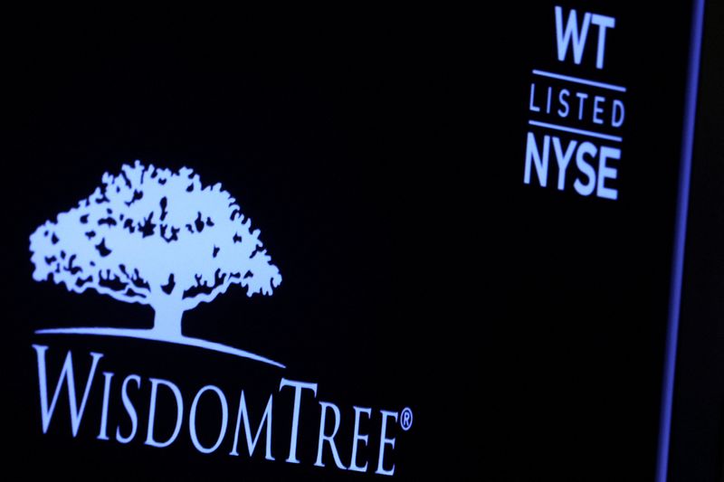 &copy; Reuters. A screen displays the logo and trading information for WisdomTree following its debut on the floor of the New York Stock Exchange (NYSE) in New York City, U.S., November 7, 2022. REUTERS/Brendan McDermid/File Photo