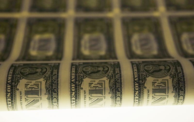 &copy; Reuters. A sheet of United States one dollar bills is seen on a light table during production at the Bureau of Engraving and Printing in Washington November 14, 2014.   REUTERS/Gary Cameron/File Photo