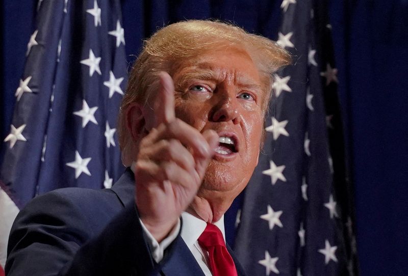 &copy; Reuters. FILE PHOTO: Republican presidential candidate and former U.S. President Donald Trump gestures during a campaign rally on March 2 in Richmond, Virginia, U.S. March 2, 2024.  REUTERS/Jay Paul/File Photo