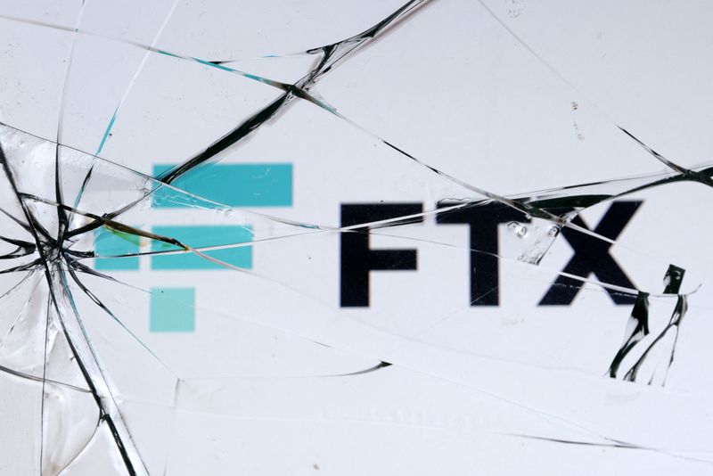 &copy; Reuters. FILE PHOTO: An FTX logo is seen through broken glass in this illustration taken, December 13, 2022 REUTERS/Dado Ruvic/Illustration/File Photo