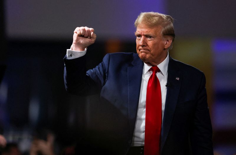 &copy; Reuters. FILE PHOTO: Former U.S. President and Republican presidential candidate Donald Trump gestures as he participates in a Fox News town hall with Laura Ingraham in Greenville, South Carolina, U.S. February 20, 2024.  REUTERS/Sam Wolfe/File photo