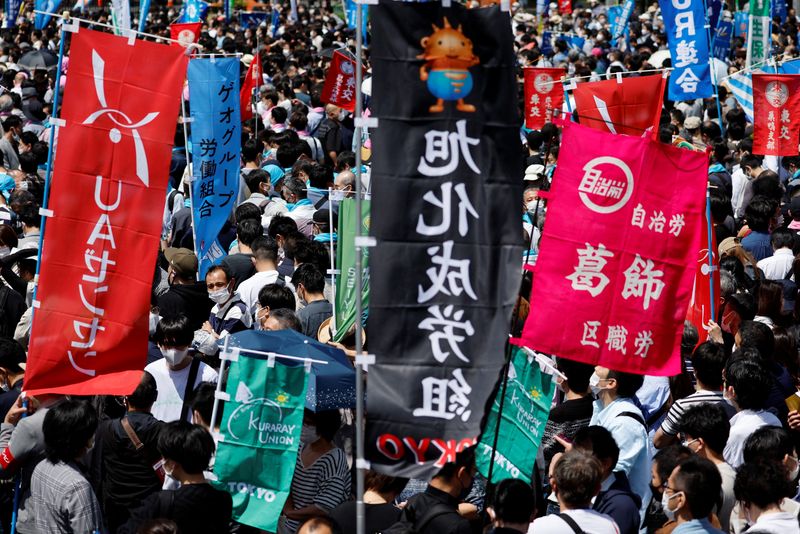 &copy; Reuters. Members of the Japanese Trade Union Confederation, commonly known as Rengo, gather at their annual May Day rally to demand higher pay and better working conditions, in Tokyo, Japan April 29, 2023. REUTERS/Issei Kato/File photo