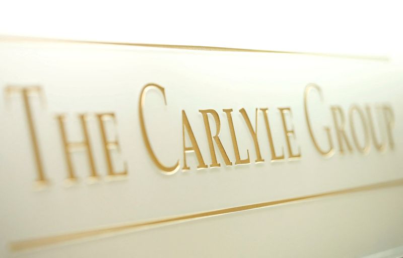 &copy; Reuters. FILE PHOTO: The logo of the Carlyle Group is displayed at the company's office in Tokyo, Japan October 17, 2018. REUTERS/Issei Kato/File Photo/File Photo