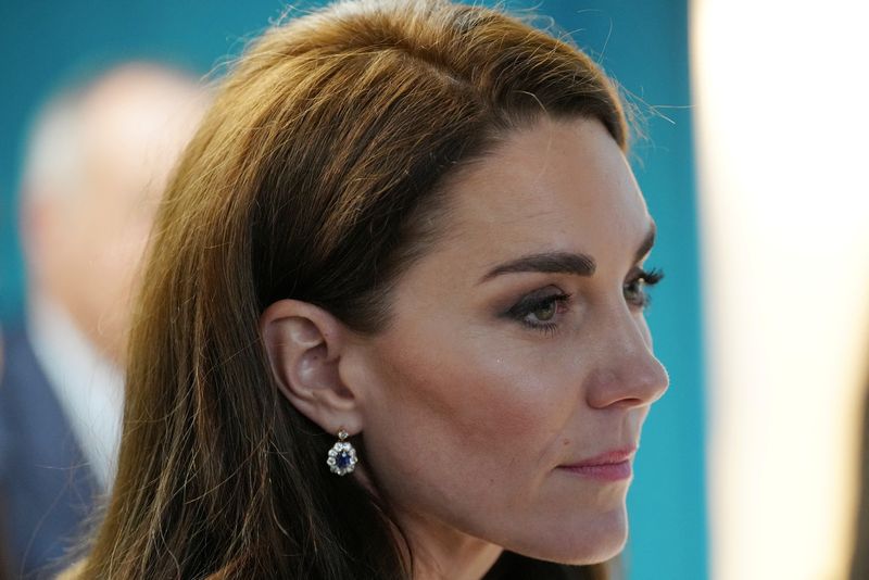 &copy; Reuters. FILE PHOTO: Britain's Kate, Princess of Wales, listens to staff as she and Prince William visit the Open Door Charity, a charity focused on supporting young adults across Merseyside with their mental health, using culture and creativity as the catalyst fo
