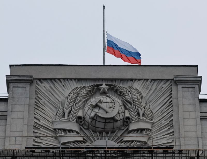 &copy; Reuters. A Russian national flag is seen lowered on the headquarters of State Duma, the lower house of parliament, on the day of mourning, declared following a deadly shooting in the Crocus City Hall concert hall, in Moscow, Russia  March 24, 2024.  REUTERS/Shamil