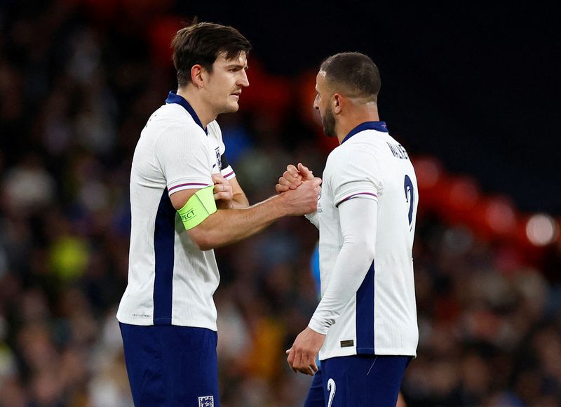 &copy; Reuters. FILE PHOTO: Soccer Football - International Friendly - England v Brazil - Wembley Stadium, London, Britain - March 23, 2024 England's Harry Maguire receives the captain's armband as Kyle Walker is substituted off Action Images via Reuters/Peter Cziborra/F