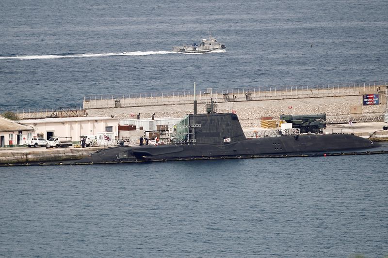 &copy; Reuters. FILE PHOTO: A British nuclear Astute-class submarine HMS Ambush is seen docked in a port while it is repaired after it was involved in a "glancing collision" with a merchant vessel off the coast of the peninsula of Gibraltar on Wednesday, in the British o
