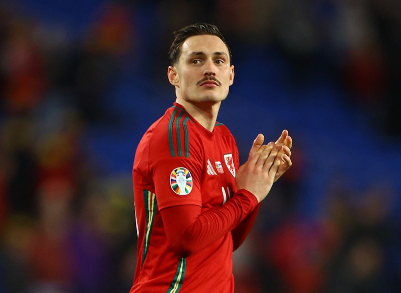&copy; Reuters. Soccer Football - Euro 2024 Qualifier - Play-Off - Wales v Finland - Cardiff City Stadium, Cardiff, Wales, Britain - March 21, 2024 Wales' Connor Roberts celebrates after the match REUTERS/Molly Darlington