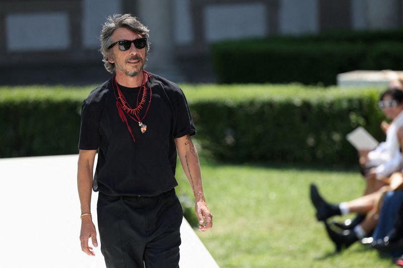 &copy; Reuters. FILE PHOTO: Designer Pierpaolo Piccioli appears at the end of his Spring/Summer 2024 collection show for fashion house Valentino during Men's Fashion Week in Milan, Italy, June 16, 2023. REUTERS/Claudia Greco/File Photo