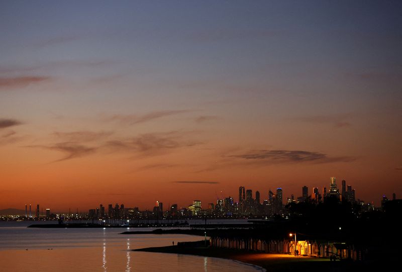 &copy; Reuters. FILE PHOTO: A view of Brighton Beach in front of the Melbourne skyline during sunset in Melbourne, Australia, July 19, 2023.   REUTERS/Hannah Mckay/File Photo