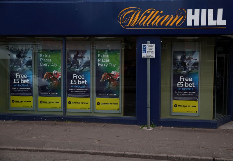 &copy; Reuters. Signage is seen outside a William Hill betting shop in Manchester, Britain March 28, 2023. REUTERS/Phil Noble/File Photo
