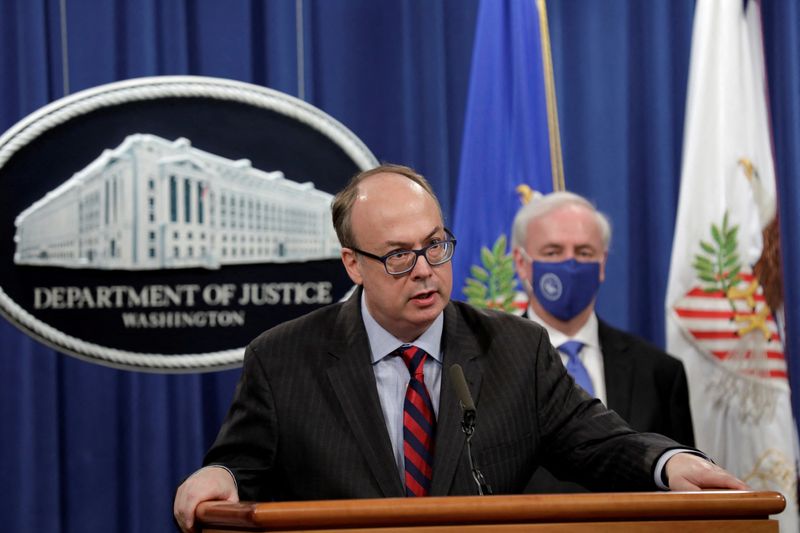 &copy; Reuters. FILE PHOTO: Acting Assistant U.S. Attorney General Jeffrey Clark speaks next to Deputy U.S. Attorney General Jeffrey Rosen at a news conference, where they announced that Purdue Pharma LP has agreed to plead guilty to criminal charges over the handling of