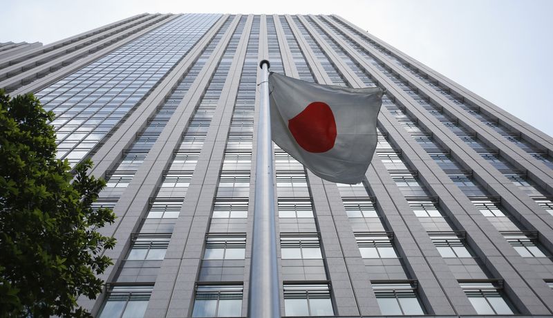 &copy; Reuters. A Japanese national flag flies in front of the building of Japan's Financial Services Agency in Tokyo August 7, 2014.  REUTERS/Toru Hanai/File Photo