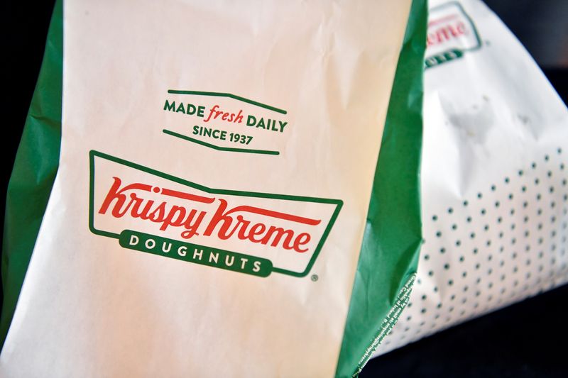 &copy; Reuters. FILE PHOTO: The logo of Krispy Kreme doughnuts is seen on a paper bag in Dublin, Ireland, December 21, 2021. REUTERS/Clodagh Kilcoyne/File Photo
